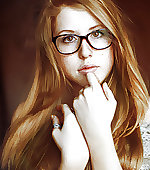 Redhead in glasses